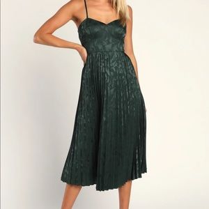 Green pleated midi dress